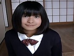 Cute Japanese college chick looks sexy in her uniform