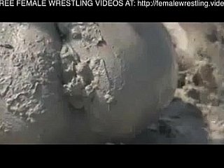 Girls wrestling to dramatize expunge mud